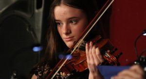 Student playing violin